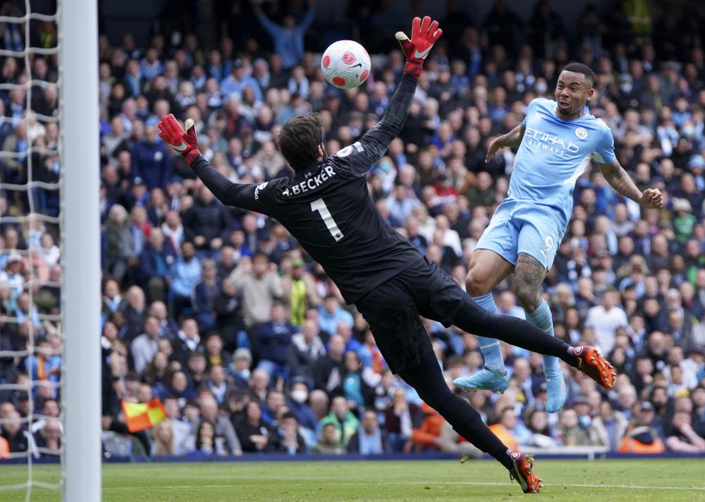 Man City remains a point ahead of Liverpool after 2-2 draw