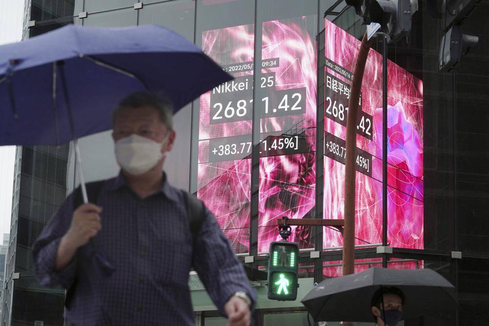 Asian shares mostly rise as markets eye US interest rates