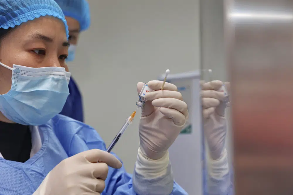 China to vaccinate elderly, many still reluctant