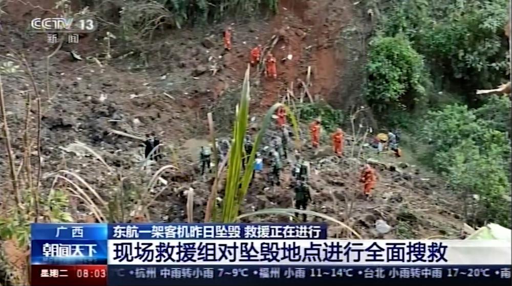 Search at China crash site suspended amid rain
