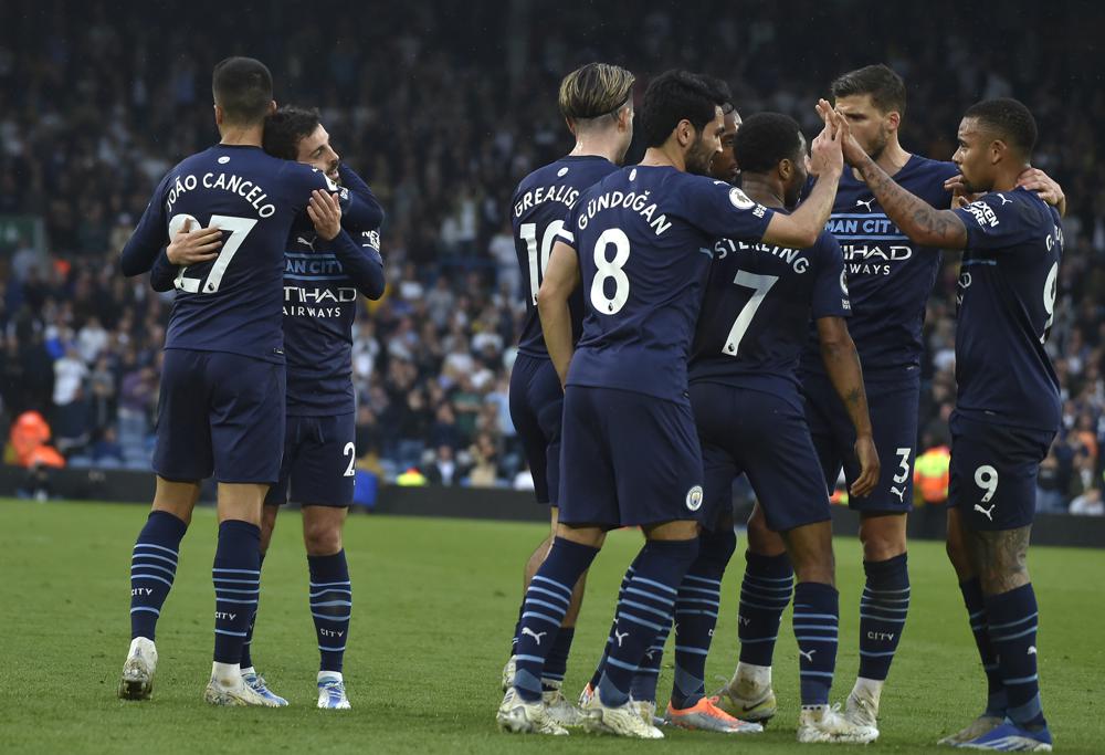 Man City, Liverpool win in EPL title race