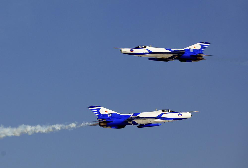 Chinese fighter jet crashes into homes, killing 1 on ground