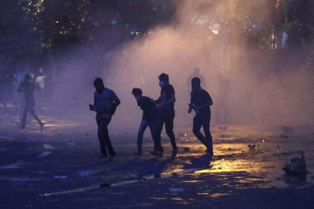 Sri Lanka imposes curfew as cops fire tear gas at protesters