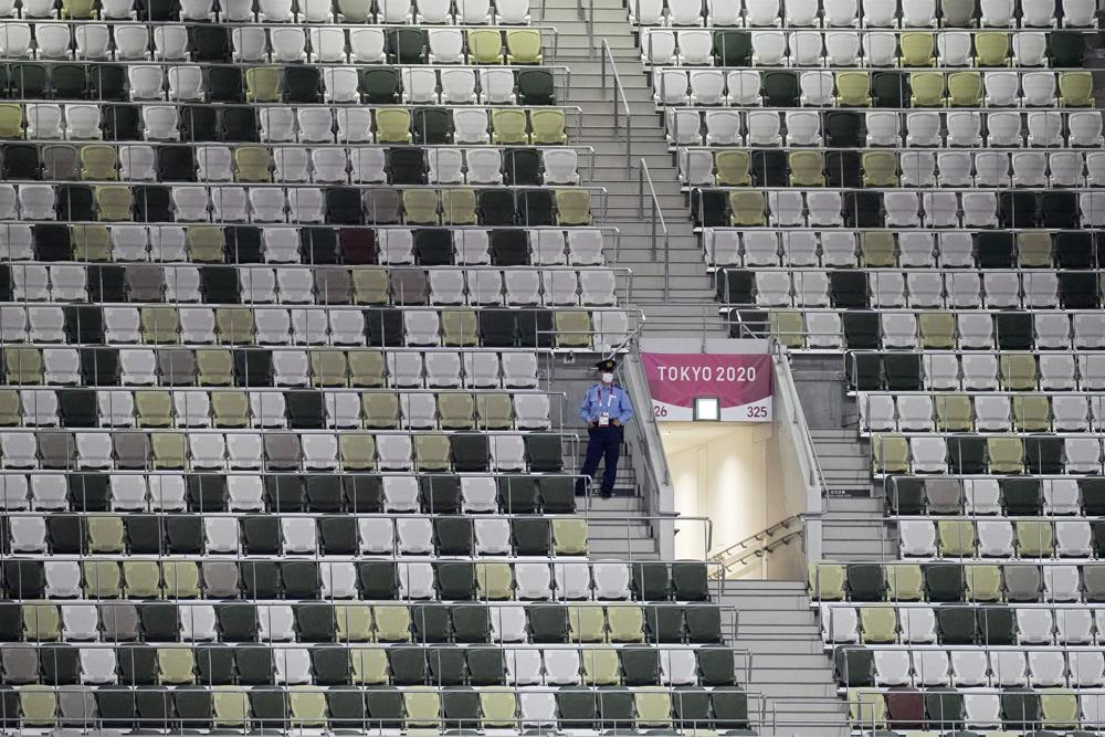 As Tokyo Games open, can the Olympic flame burn away the funk?