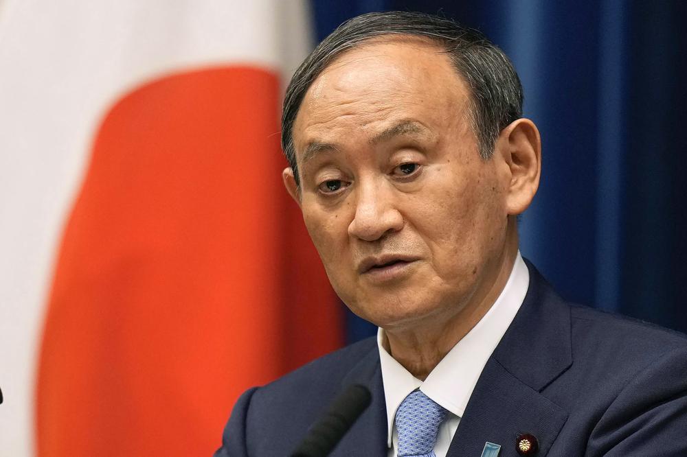 Suga bows out of party vote, paves way for new Japan PM