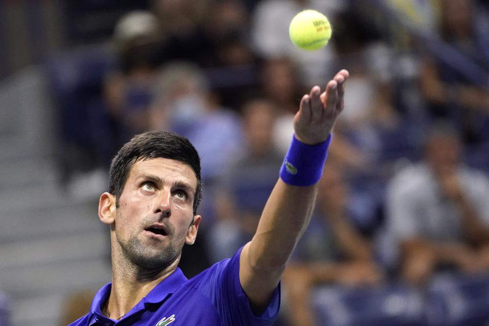 Djokovic pulls away to reach US Open quarters