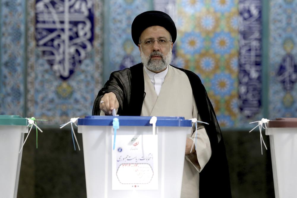 Iran votes in presidential poll tipped in hard-liner’s favor