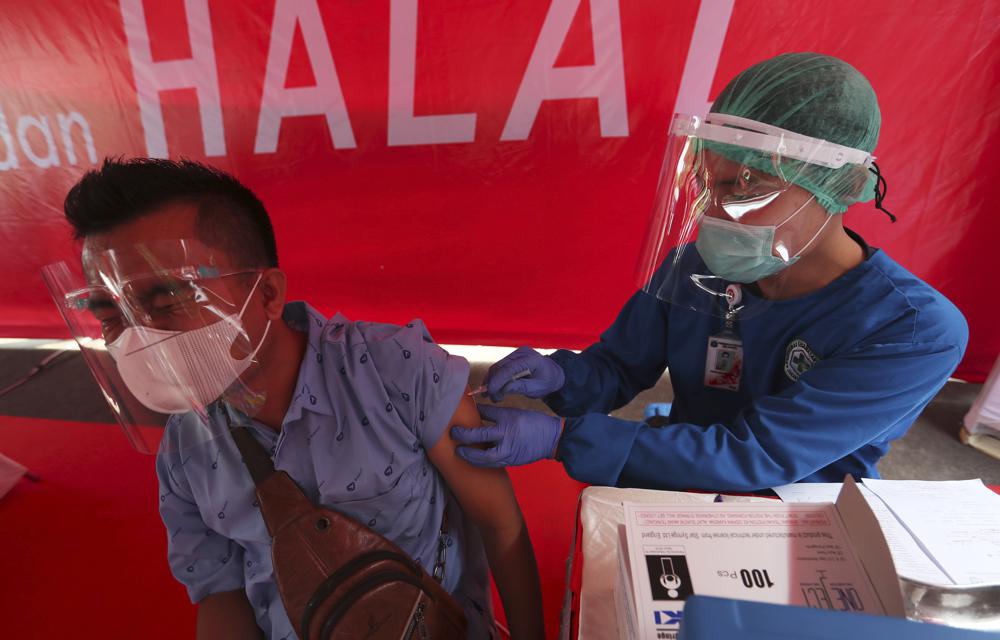 Asia welcomes US vaccine donations amid cold storage worries