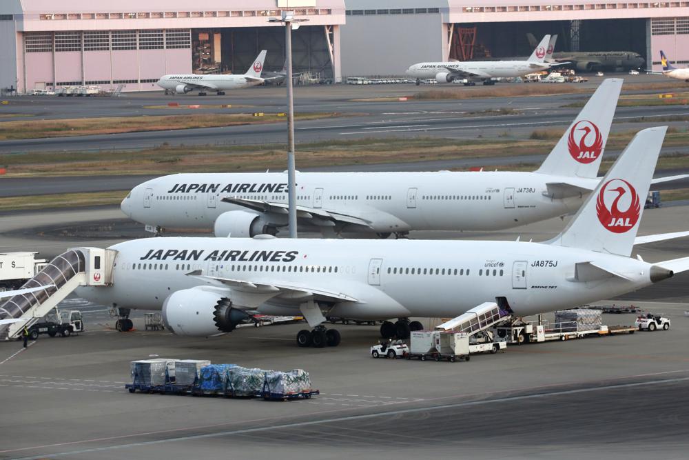 Japan suspends new flight reservations