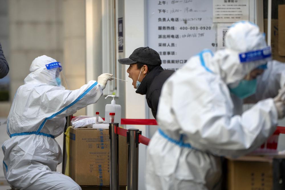Chinese city plans 250,000 quarantine beds to fight virus