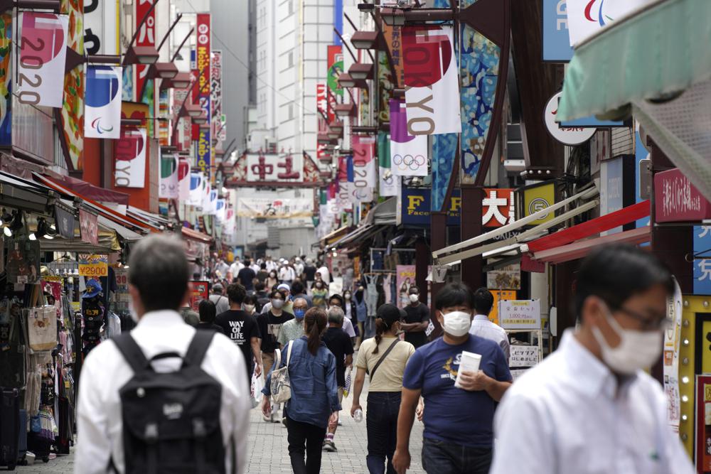 Japan widens COVID emergency after record spike amid Games