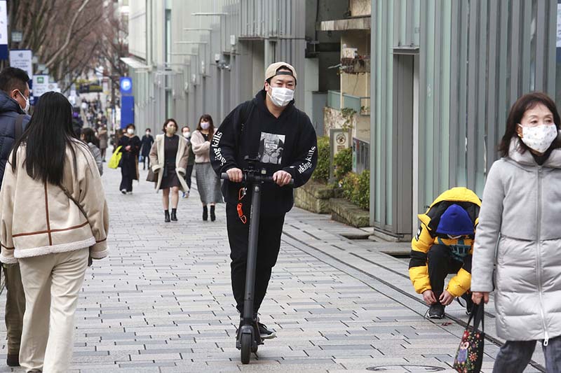 Japan extends emergency amid vaccine, Olympic uncertainty