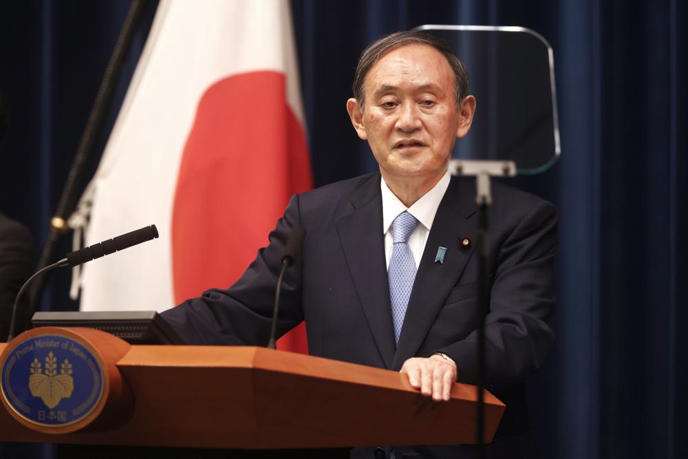 Japan extends virus emergency with Olympics around the corner