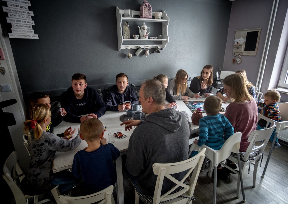 German mother of 11 kids fights virus with discipline, love