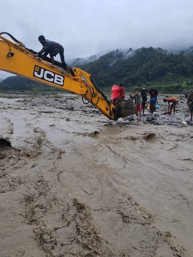 Eight persons spent night in middle of the river in Lamjung