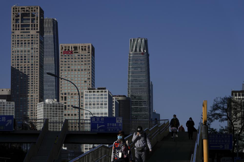 China’s economy slows as Beijing wrestles with debt