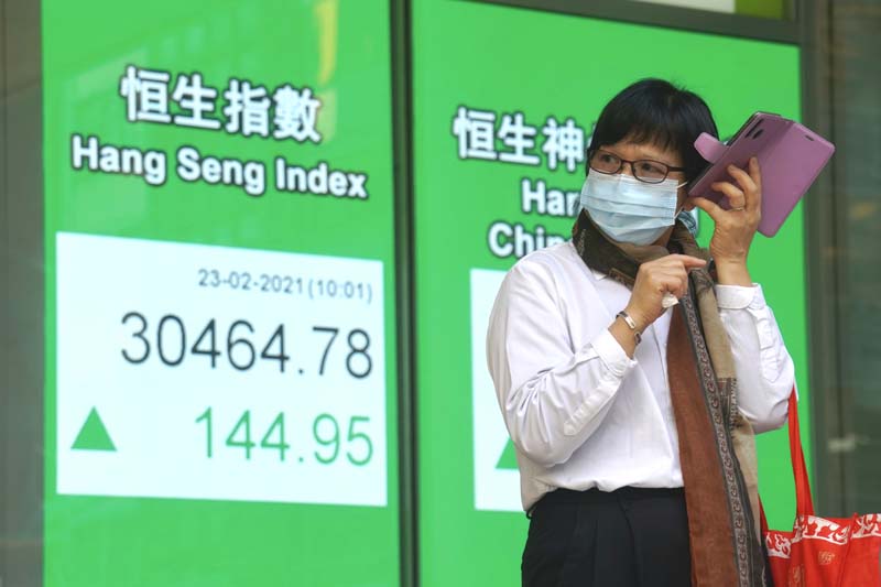 Global shares mixed amid vaccine optimism, US tech sell-off