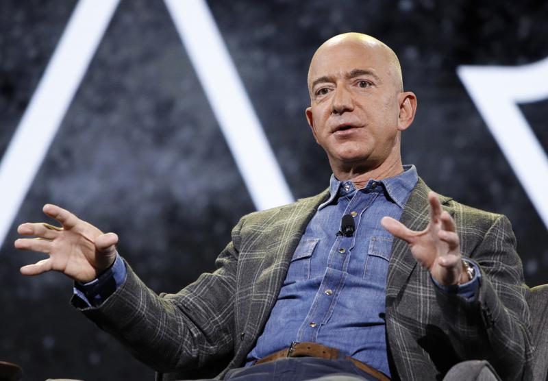 Winning auction bid to fly in space with Jeff Bezos