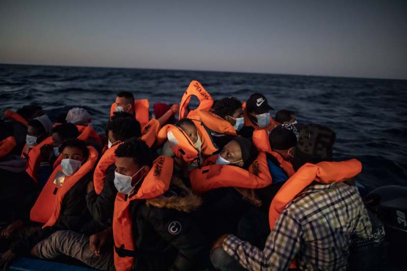 Migrants evade Libyan coast guard to reach Europe