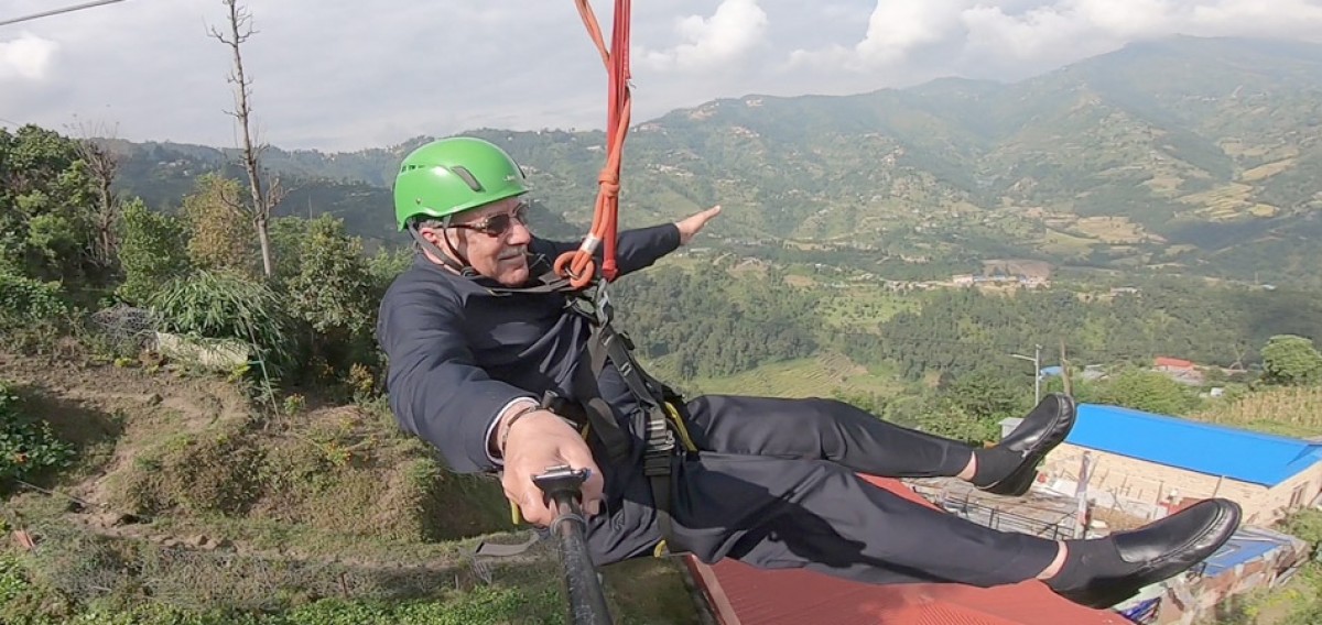 Pushpa Kamal Dahal enjoying zip line in Dhulikhel