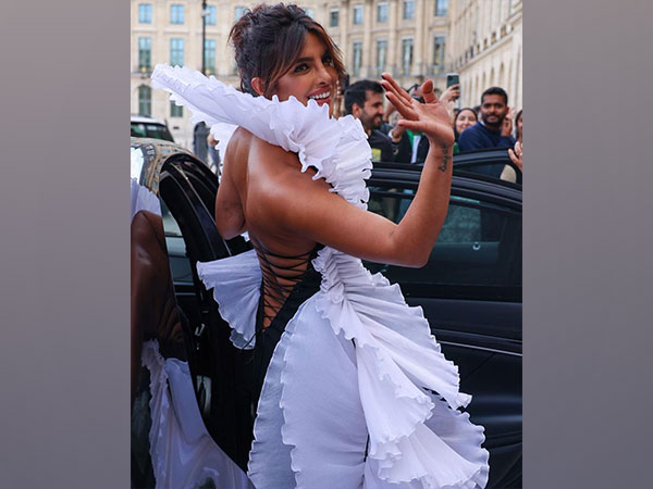 Priyanka takes over Paris in a beautiful black evening gown!