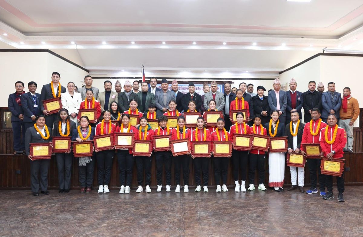PM Oli hands prize to medal winning players of int’l sports championship
