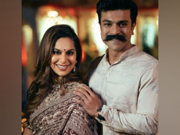 Ram Charan’s wife throws confetti at a theatre while watching ‘RRR’