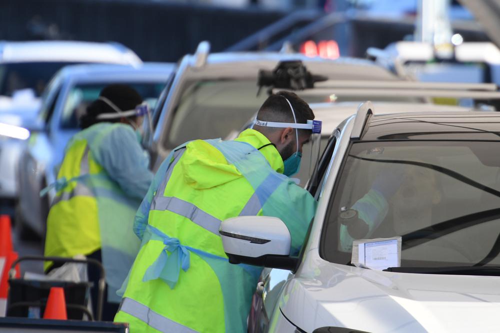 Parts of Sydney going into lockdown as virus surge