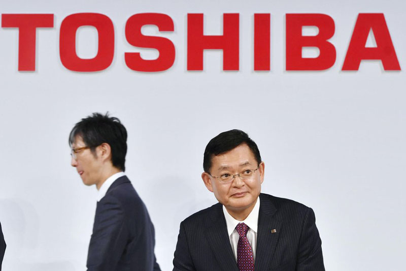 Japan’s Toshiba president steps down amid acquisition talks