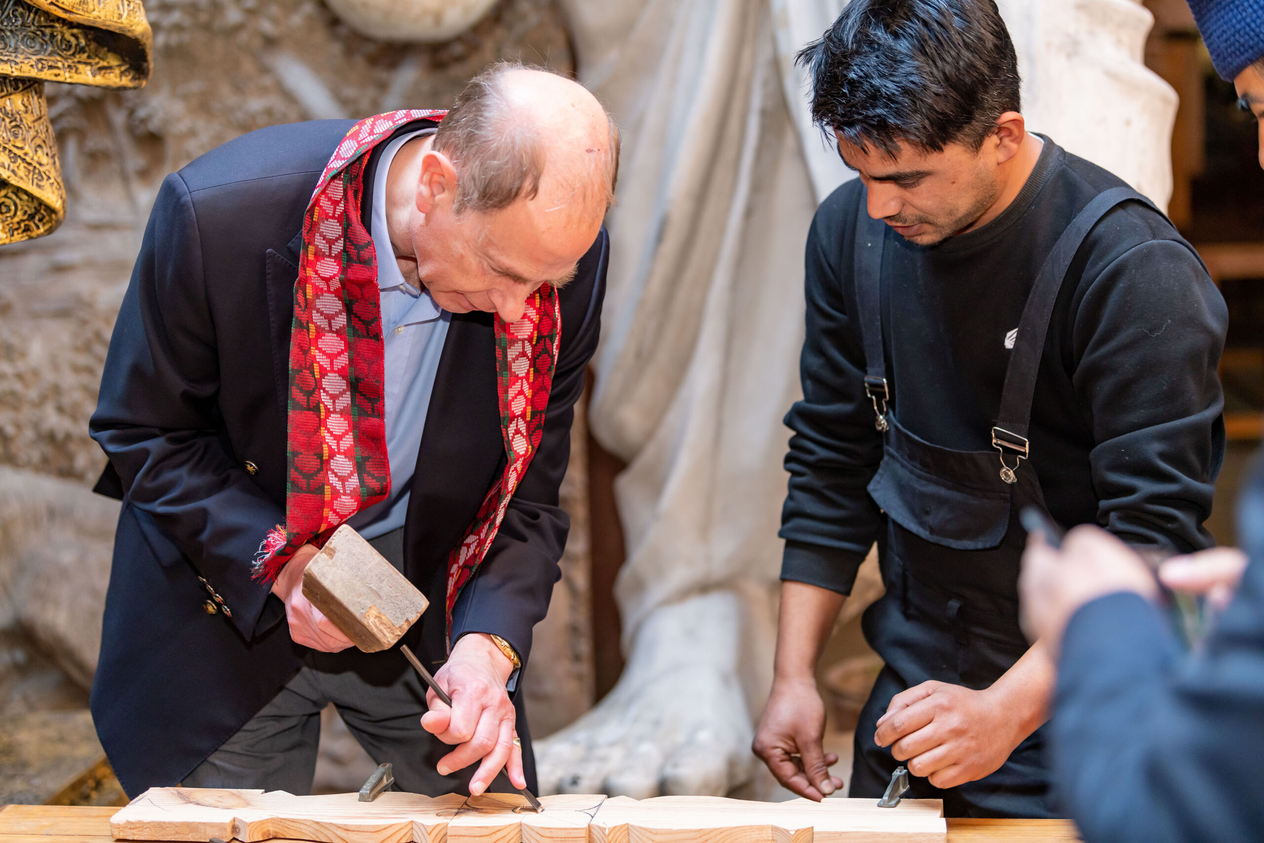 Prince Edward tries wood carving in Bhaktapur