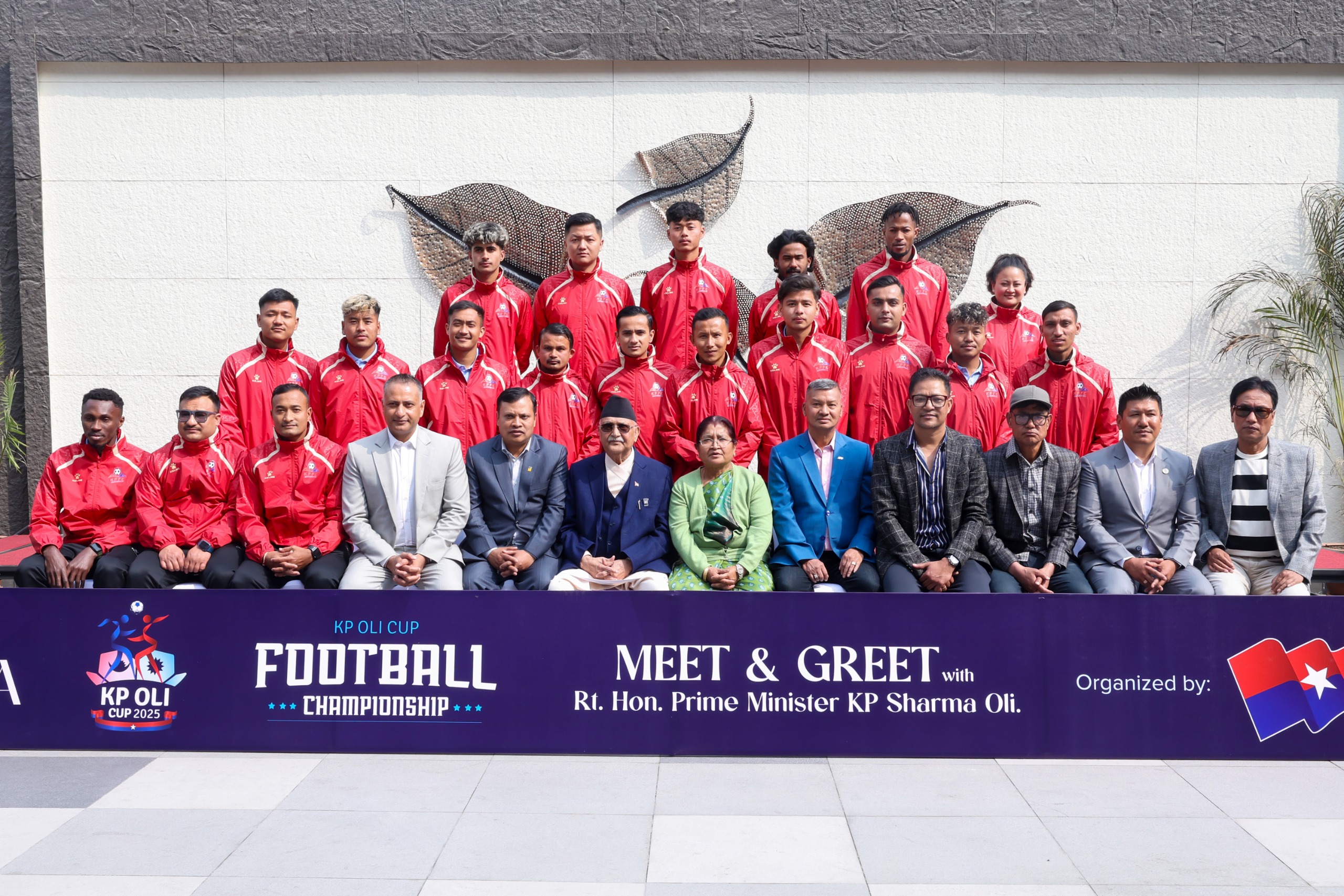 PM Oli meets with players of KP Oli Cup Football Championship