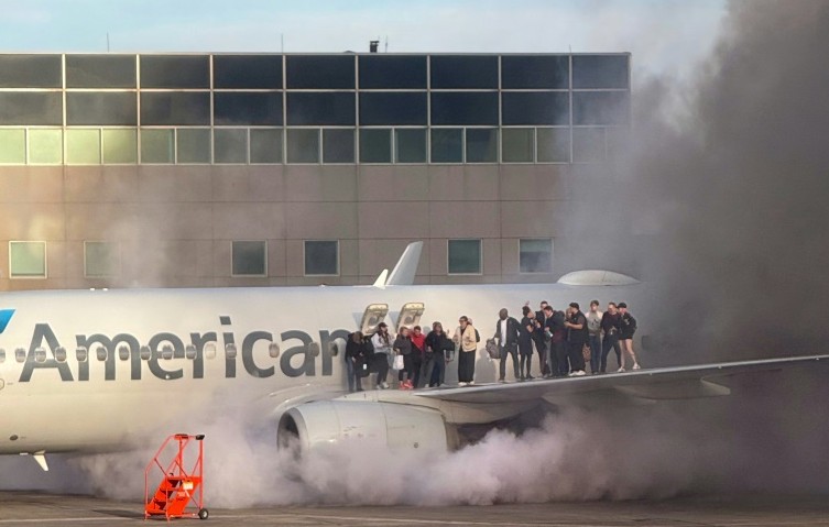 Fire aboard US airliner after diverted to Denver, 12 injured