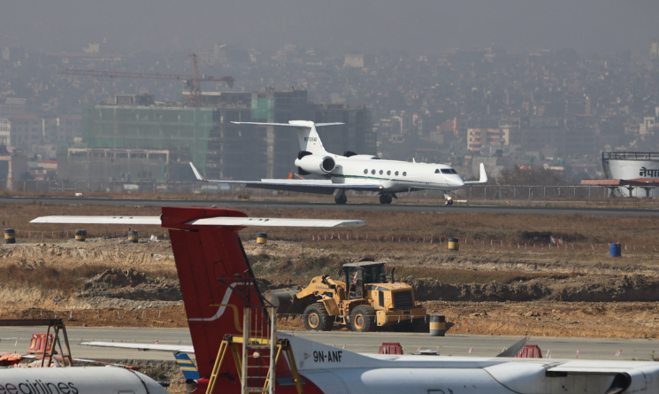 Plane Carrying Deported Nepalis from the U.S. Lands in Kathmandu