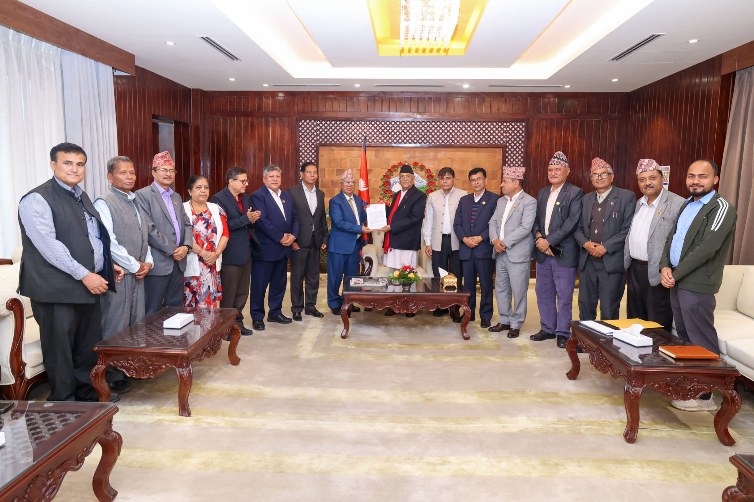 CPN (US) submits memorandum before PM Oli