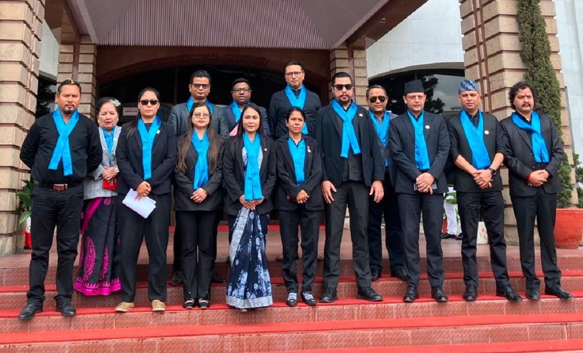 RSP MPs attend Parliament wearing black clothes and blue scarves