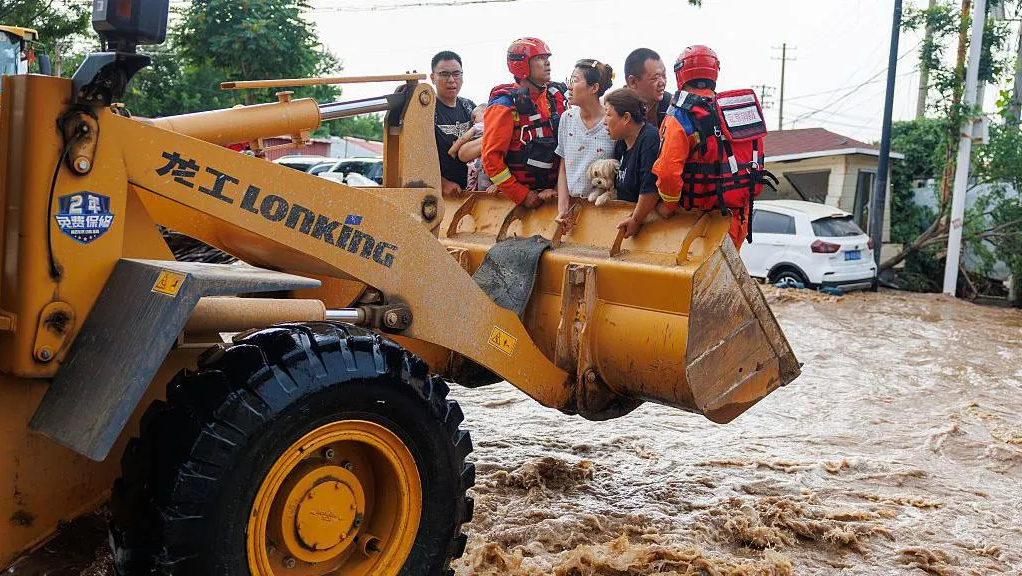 At least 30 dead, 80,000 evacuated as deadly floods hit Beijing