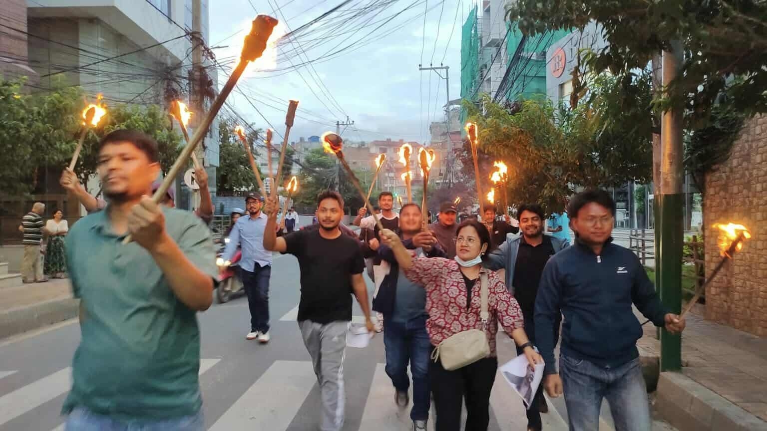 Students torch effigies of PM Oli and Education Minister Panta