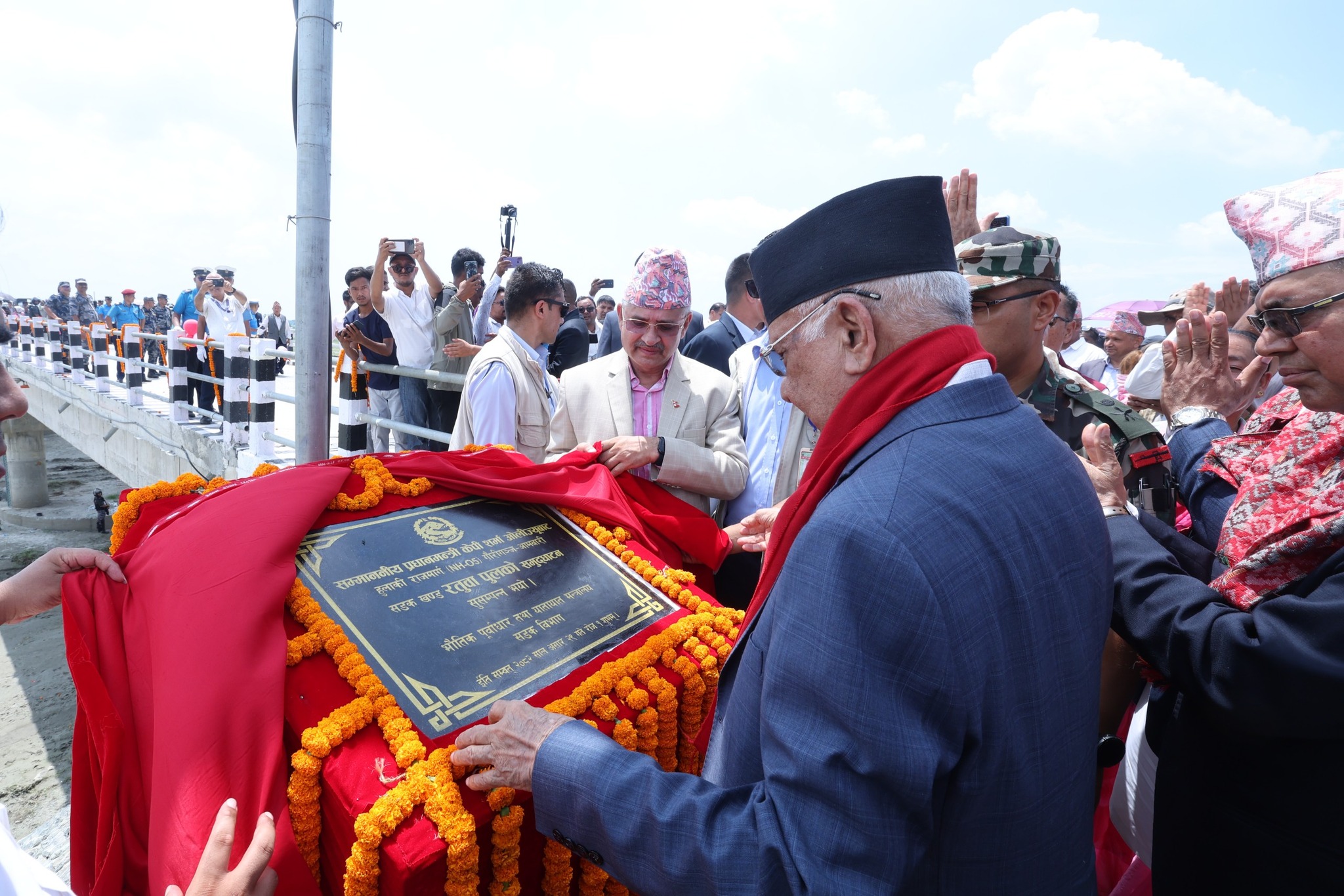 PM inaugurates bridge along the Postal Highway