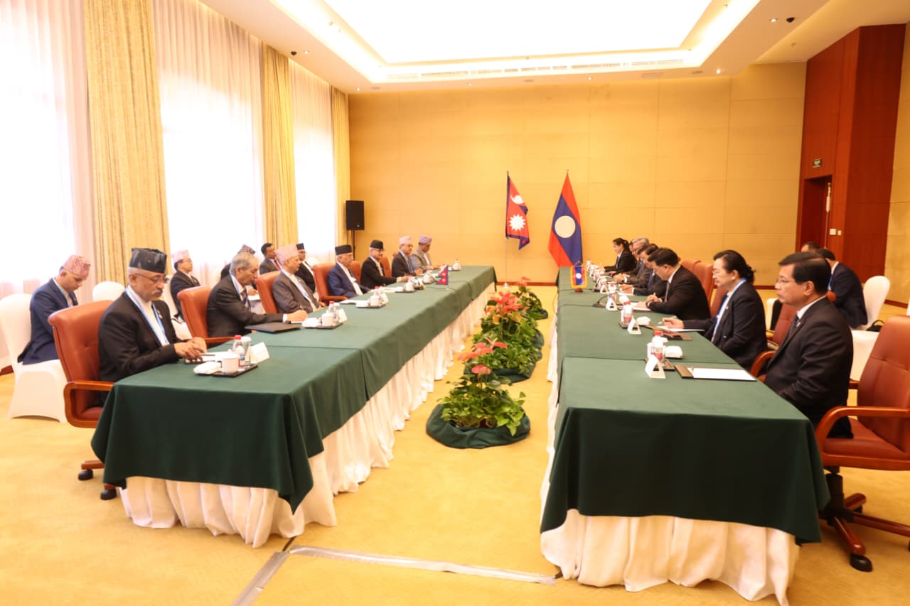 PM Oli meets Lao President Sisoulith in Tianjin