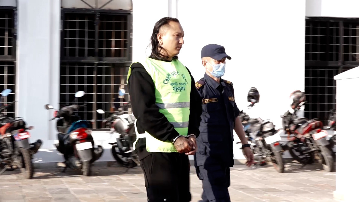 Tenzing Dawa remanded for further investigation after arrest with pistol and “TOB” t-shirt