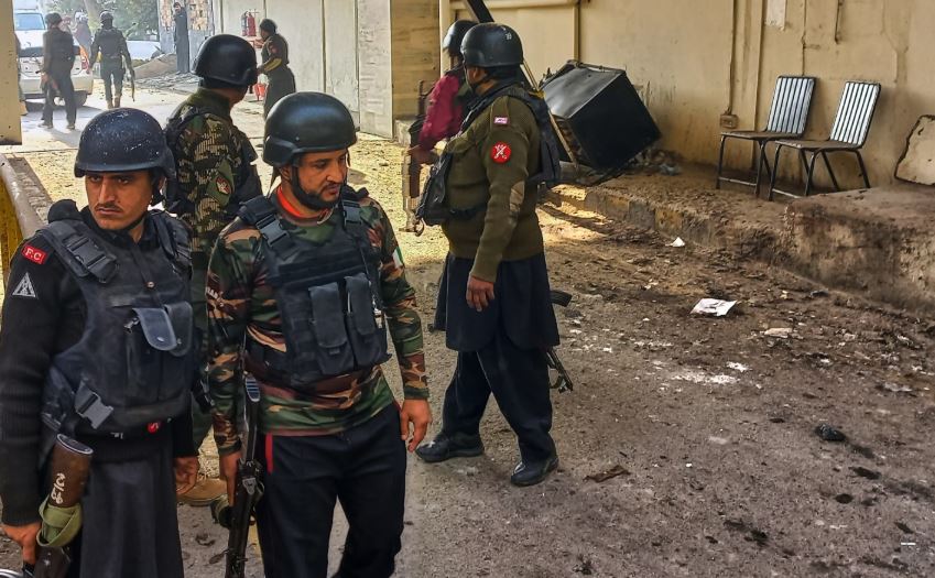 Suicide bombers strike security force headquarters in northwestern Pakistan, killing 3 officers