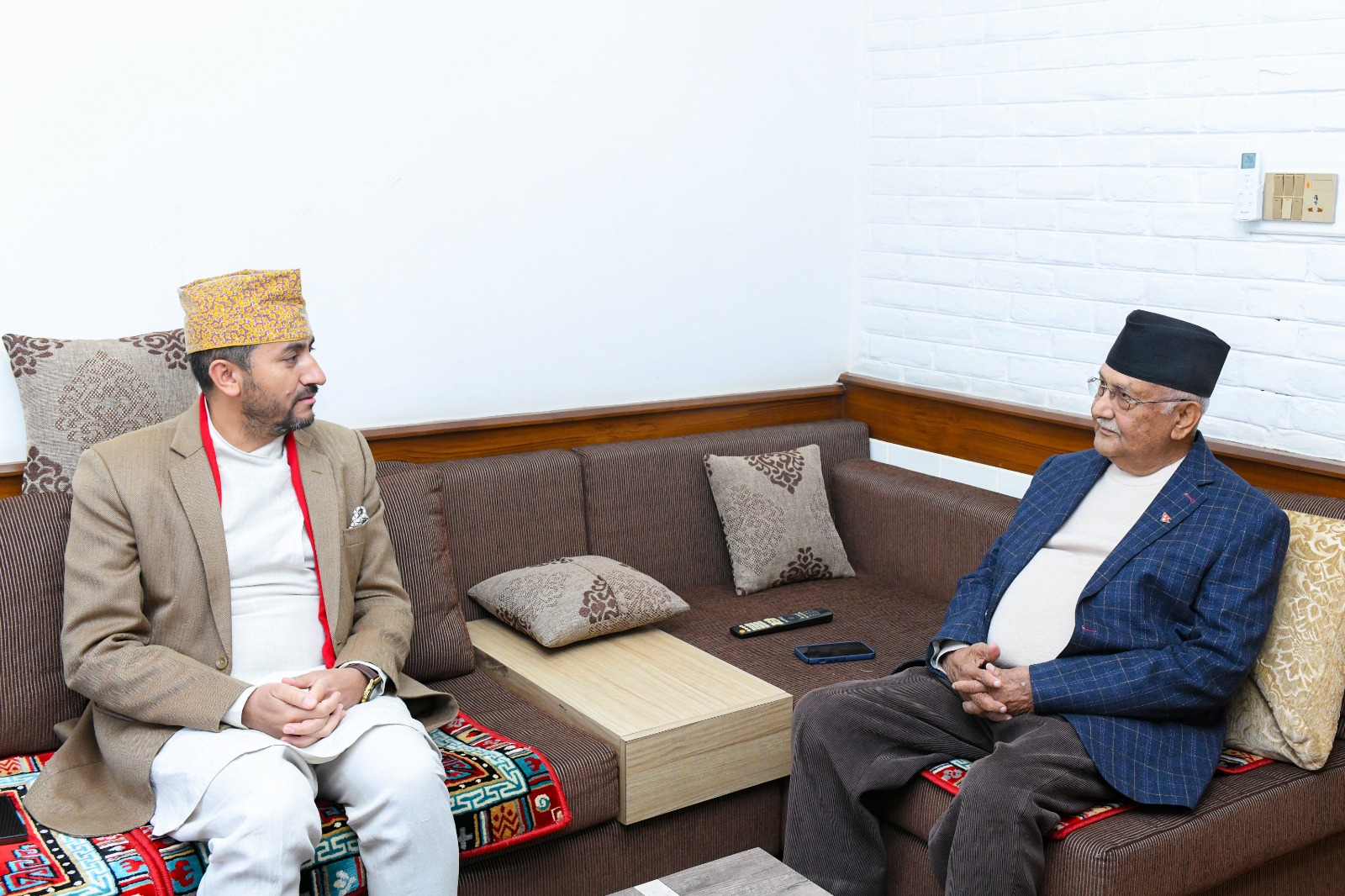 UML Chairperson Oli and Communication Minister Kharel meet