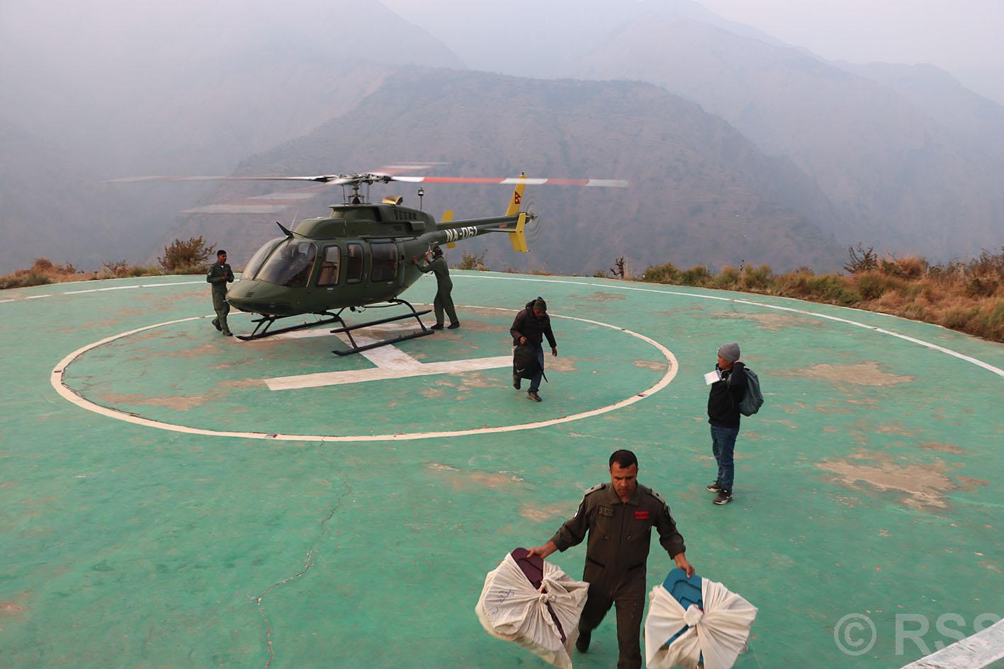 Ballot boxes from remote areas being collected by helicopters