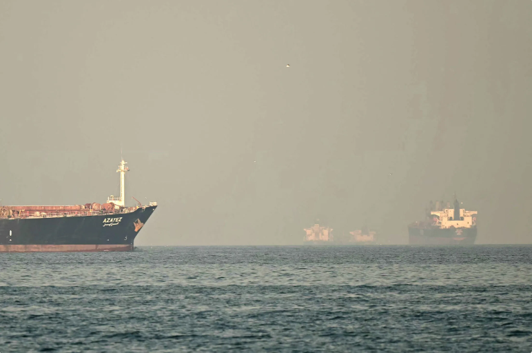 Drones fall near Dubai airport, ships hit as Iran presses on with attacks