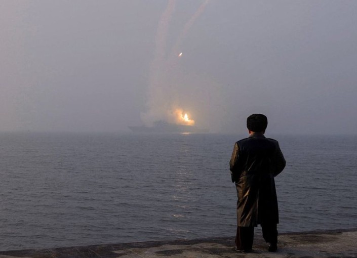 North Korea ruler Kim oversees cruise missile tests from new naval destroyer