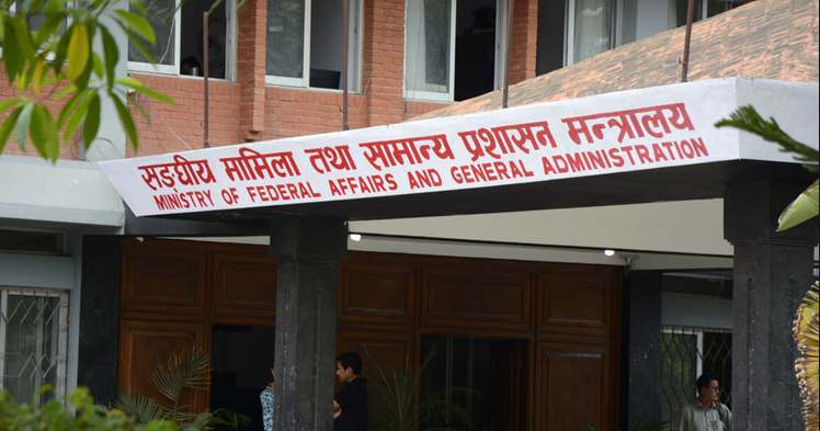Government warns employees of dismissal over political activities