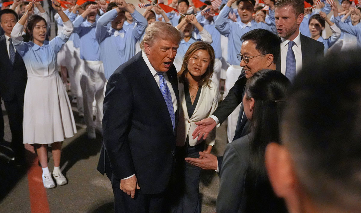 Trump arrives in China for high-stakes meeting with Xi