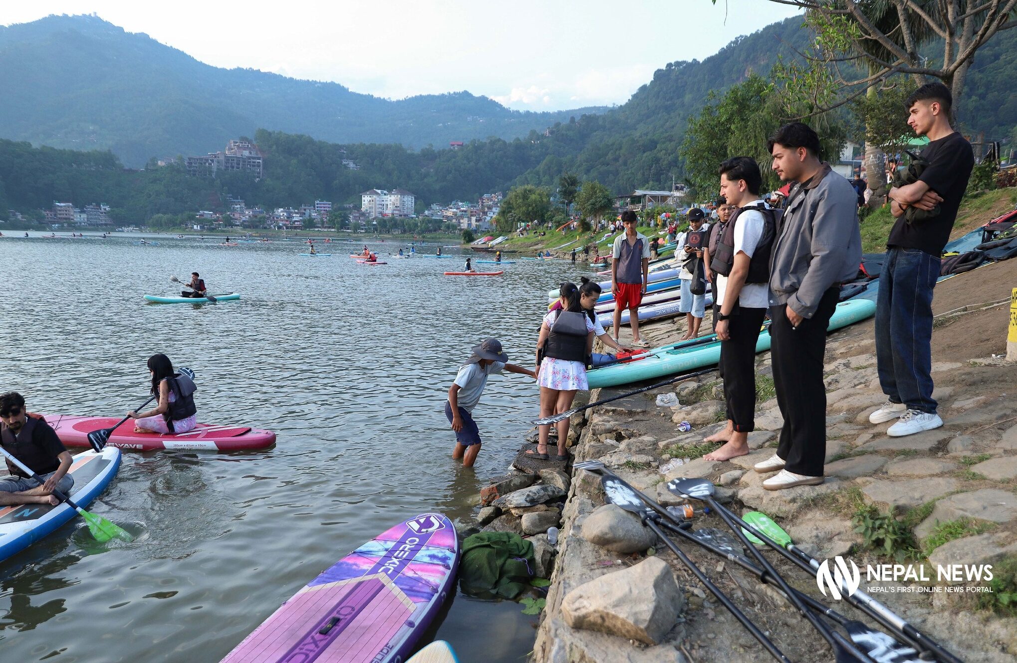 Tourists flock to Phewa Lake for relief amid rising heat (Photo Feature)