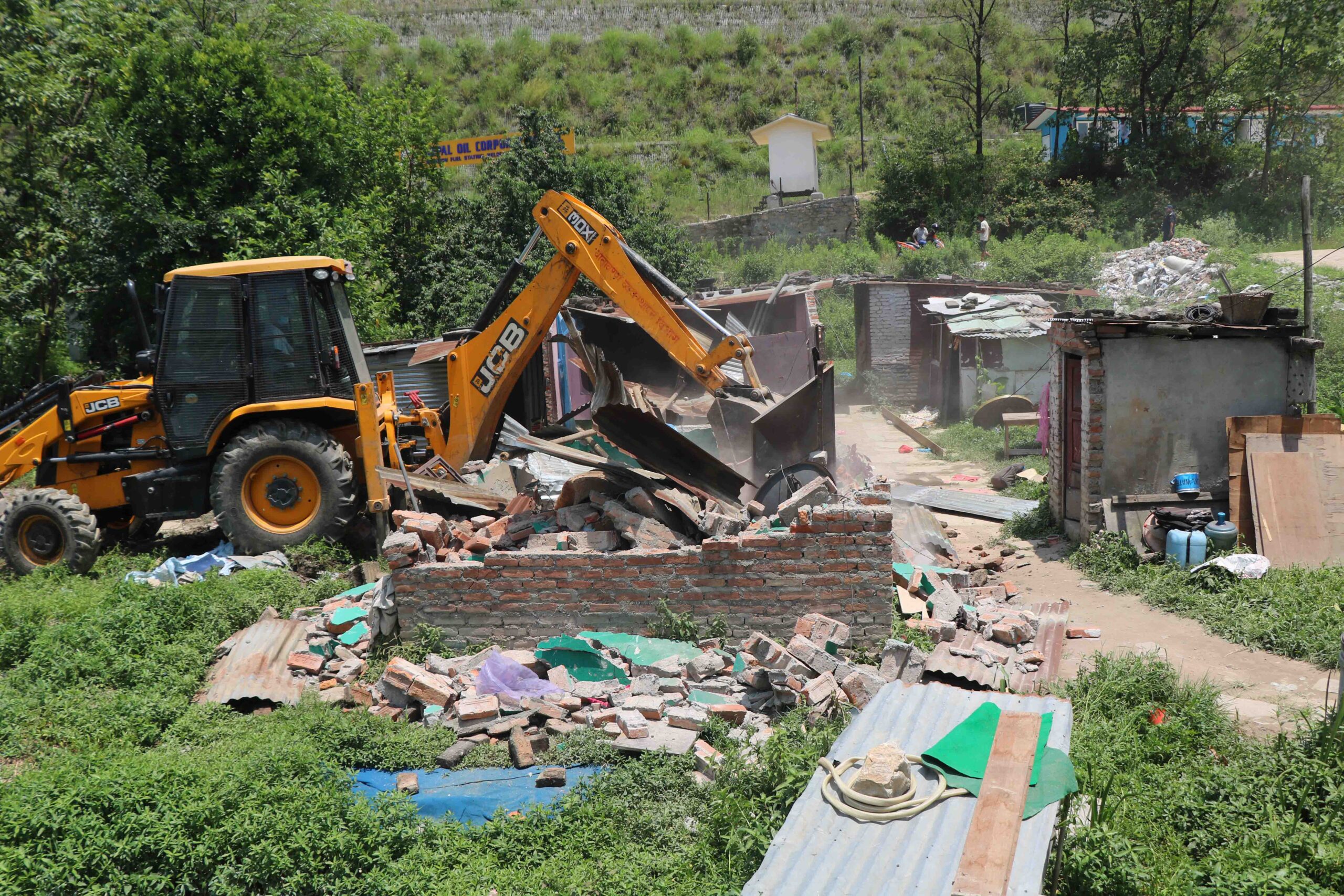 Encroached structures demolished in Panchakanya settlement [Photo Feature]