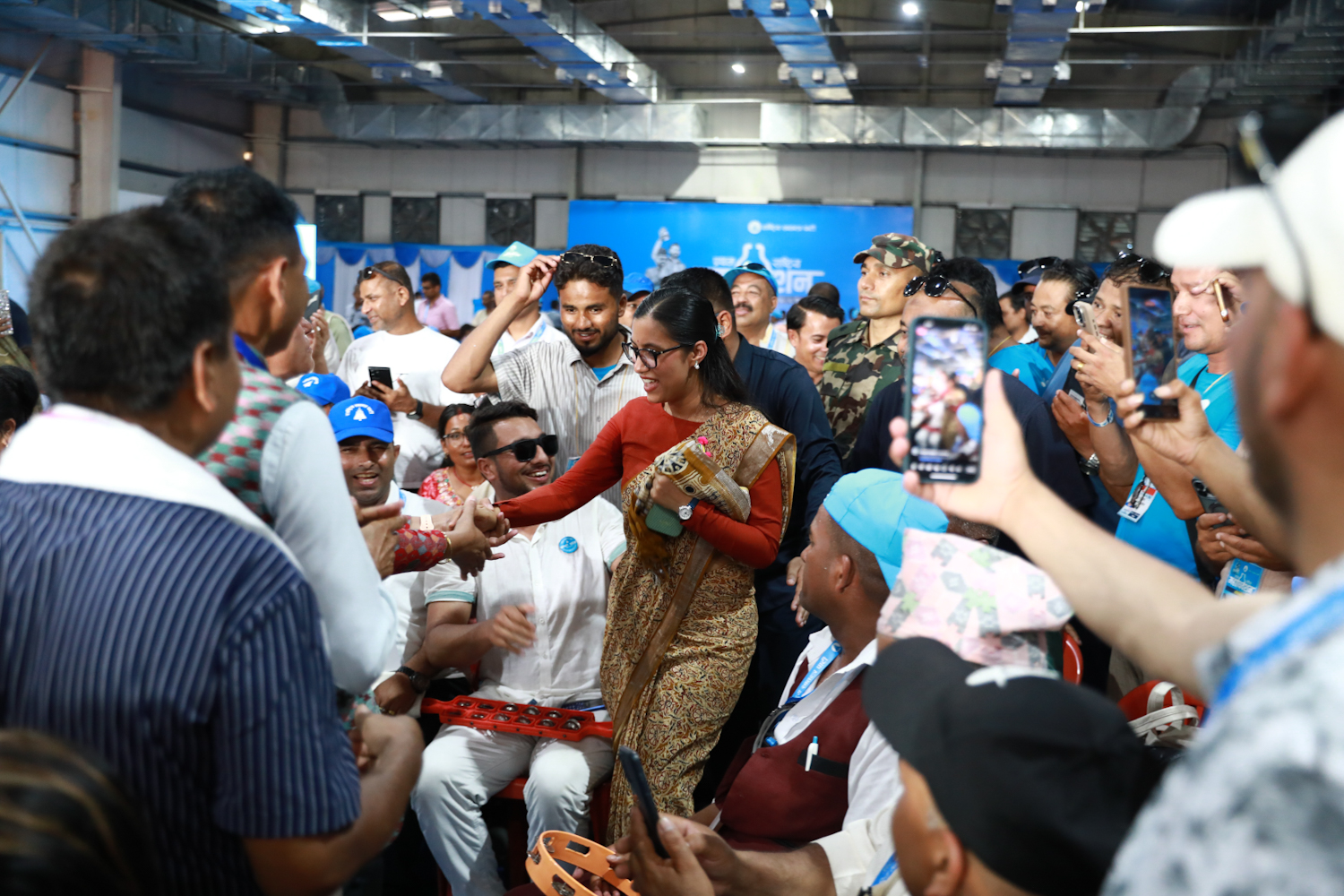 Ministers and party leaders join dancing and singing inside convention hall ahead of election [Photo Feature]
